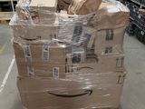 a cart full of boxes sitting in a warehouse