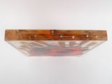 a wooden shelf that has a bunch of screws in it