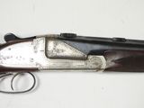 an old gun that is sitting on top of a table