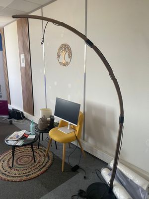 an image of a living room with a computer on the floor