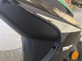 a close up of a motorcycle with a black seat