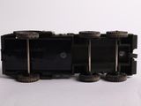 a toy train that is sitting on a white surface