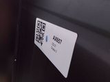 a qr code on the side of a stainless steel refrigerator