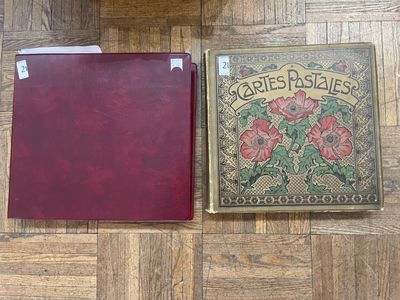 two books sitting on the floor next to each other