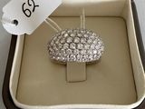 a diamond ring in a box with a price tag on it