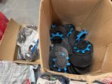 a cardboard box filled with assorted items on the floor