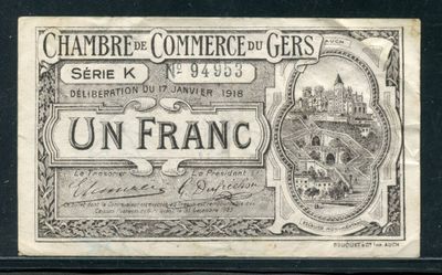 une photo en noir et blanc d'un billet de banque sur lequel figure l'image d'un château