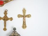 three crosses on the wall next to each other