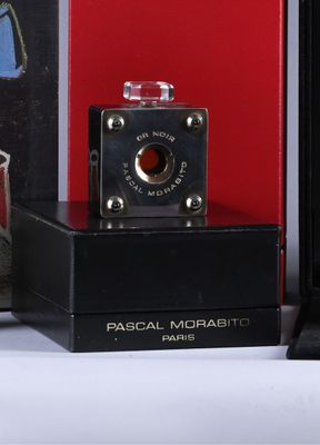 a black box with a red box and a black box with a red box on it