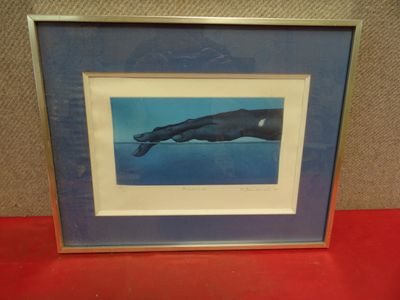 une image représentant une photo encadrée d'une baleine à bosse