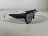 black and white sunglasses on a table with a white background