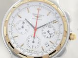a close up of a wrist watch with a white dial
