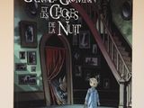 un livre sur lequel figure l'image d'une petite fille en robe bleue, debout devant un escalier