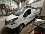 a white van that is parked in a garage