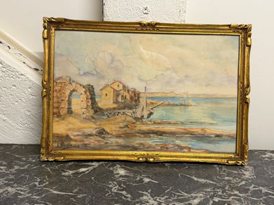 une vieille photo représentant un tableau posé sur une table près d'un mur