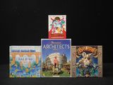 three children ' s books sitting on top of each other on a table