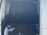 a white van that is parked in a lot