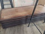 many pieces of wood stacked on top of each other