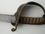 a knife that is hanging on the wall