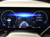 a picture of a car ' s dashboard with a display on it