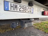 a close up of a truck with a number plate on it