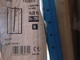 a bag of food sitting on a shelf in a room