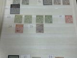 a picture of a book with a lot of stamps on it