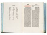 a book open to a page of text on a white background