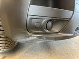 a close up view of a car ' s front bumper