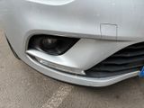 a close up of the front bumper of a car