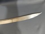 a knife that is sitting on a table