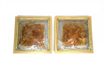 two pieces of tin foil on top of each other