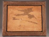 an old picture of a wooden frame with a drawing of a bird on it