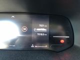 the dashboard of a car with a digital display on it