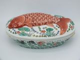 a decorative box with a fish design on it
