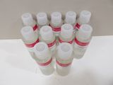 many bottles of water sitting on a white table