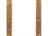 an old wooden picture frame with a decorative design on it