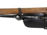 a small knife with a wooden handle attached to it