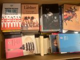 a lot of books on a shelf in a box