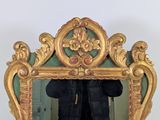 a man taking a picture of himself in a mirror