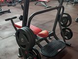 a gym with a lot of equipment in the room