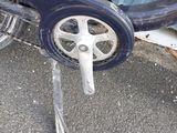 a close up of a bike with a wheel on it