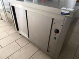 a stainless steel counter top in a commercial kitchen