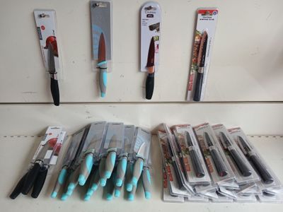 many different types of kitchen knives on the counter
