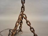 an image of a table lamp made out of chains