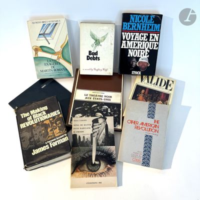 several books sitting on top of each other on a table