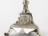 an image of a silver candle holder on a white background