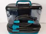 a black case with a blue handle and a cord in it