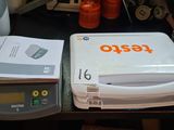 an image of a kitchen scale and a box of food