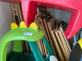 a green and red toy car and a red and green toy car